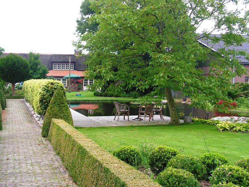 Natuurhuisje of tent in het groen